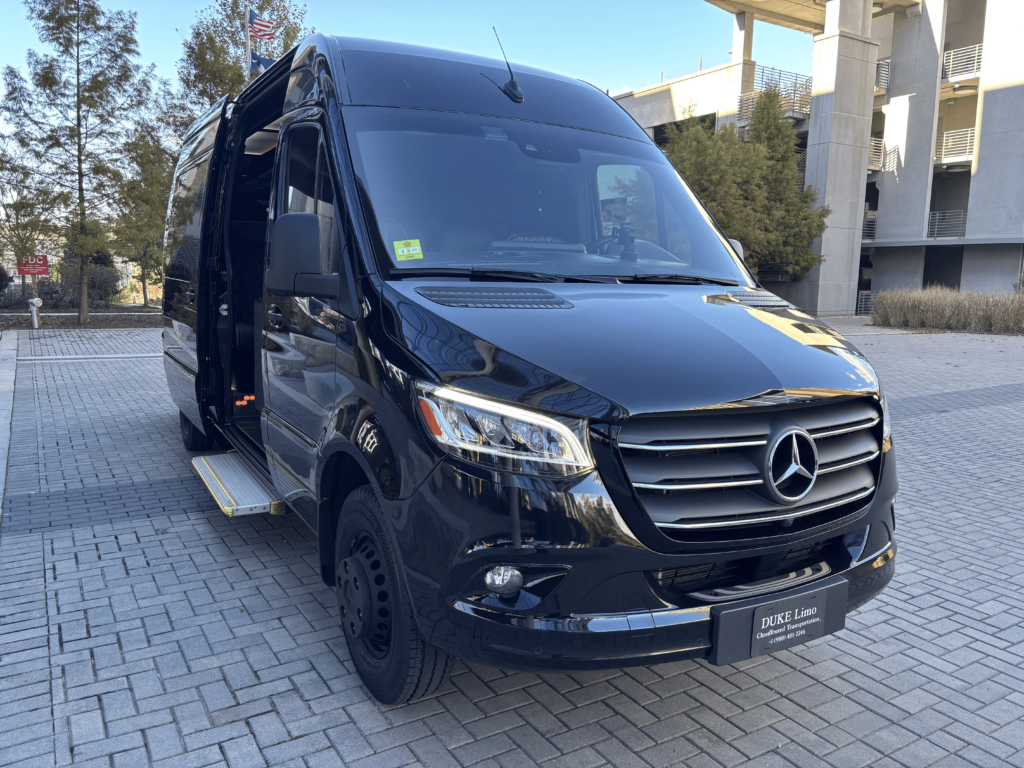 Duke Limo luxury Sprinter van with side entry open – premium black Mercedes-Benz vehicle for group and executive transportation.